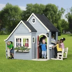 Houten speelhuis Spring Cottage van cederhout